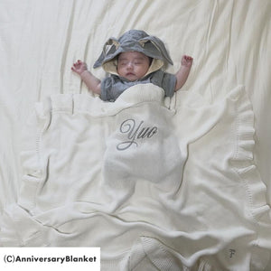 刺繍のフリルブランケット